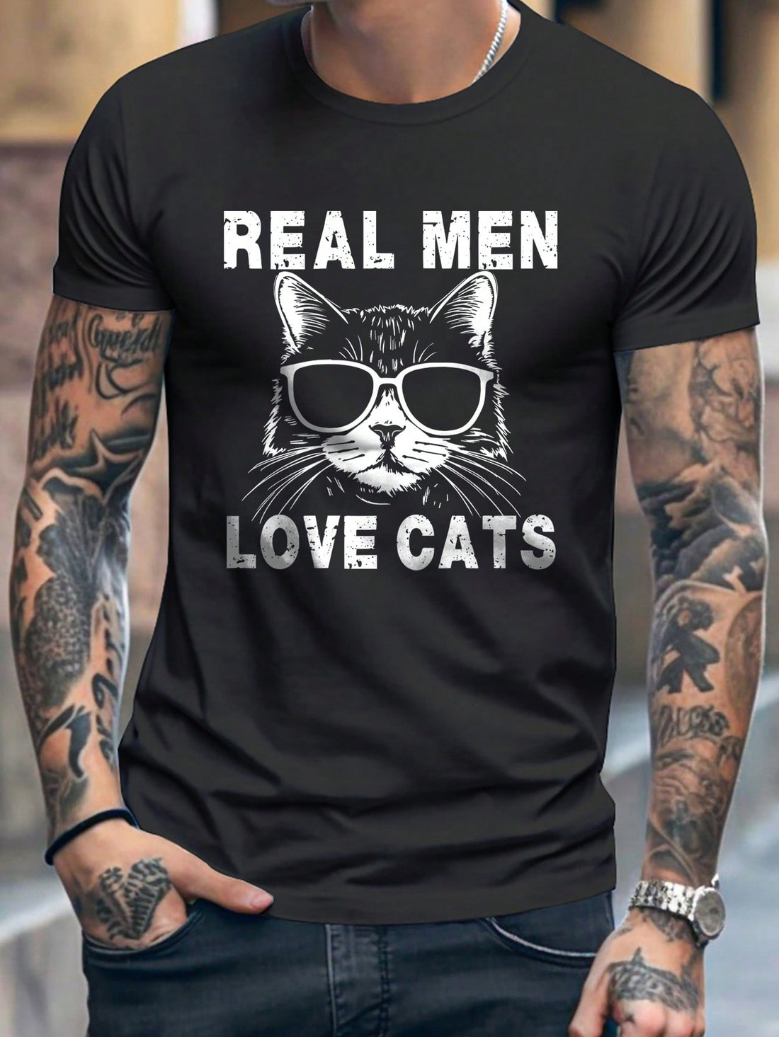 Upgrade your wardrobe with our casual and cool Cat Letter Graphic <a href="https://canaryhouze.com/collections/tshirt" target="_blank" rel="noopener">Tee</a>. Made for the trendy and hip man, this tee features a stylish cat design and bold lettering, perfect for adding a touch of personality to any outfit. Embrace your unique style with this must-have addition to any stylish collection.