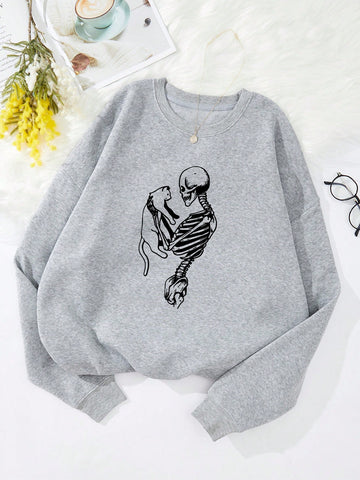 Stay warm and stylish this season with our Skeleton Print Thermal Lined Sweatshirt. The thermal lining provides extra warmth while the spooky skeleton print adds a touch of Halloween fun. Perfect for any chilly day, this sweatshirt is a must-have for the colder months.