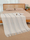 Stay warm and cozy with our Nordic Style Knitted Wave Stripe Blanket