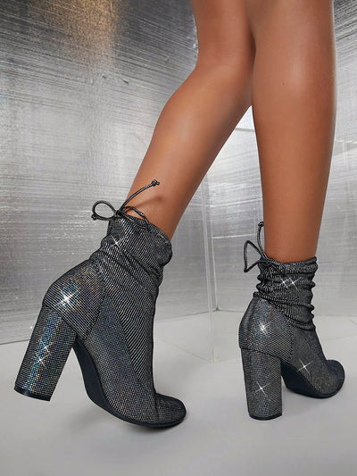 Sparkle in Style: Glitter Knot Back Chunky Boots