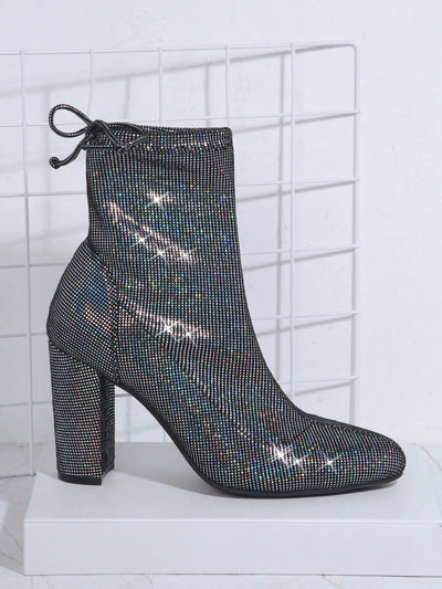 Sparkle in Style: Glitter Knot Back Chunky Boots