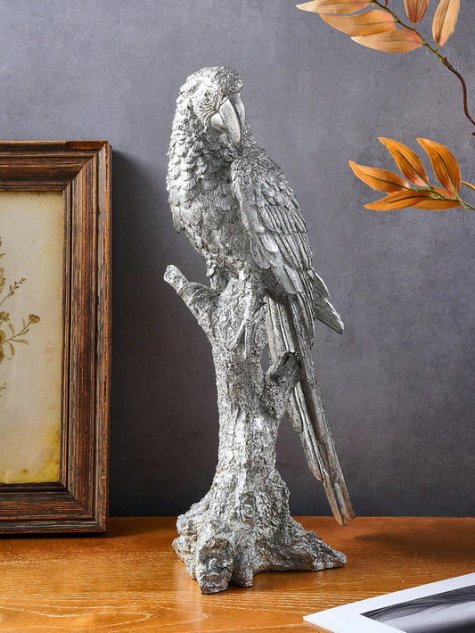 Add a touch of vintage charm to your space with this stylish Parrot on Branch Decorative Object. Expertly crafted from resin, this unique piece is the perfect addition for any home, shop, restaurant, or office. Its intricate design and attention to detail make it a must-have for any decor.