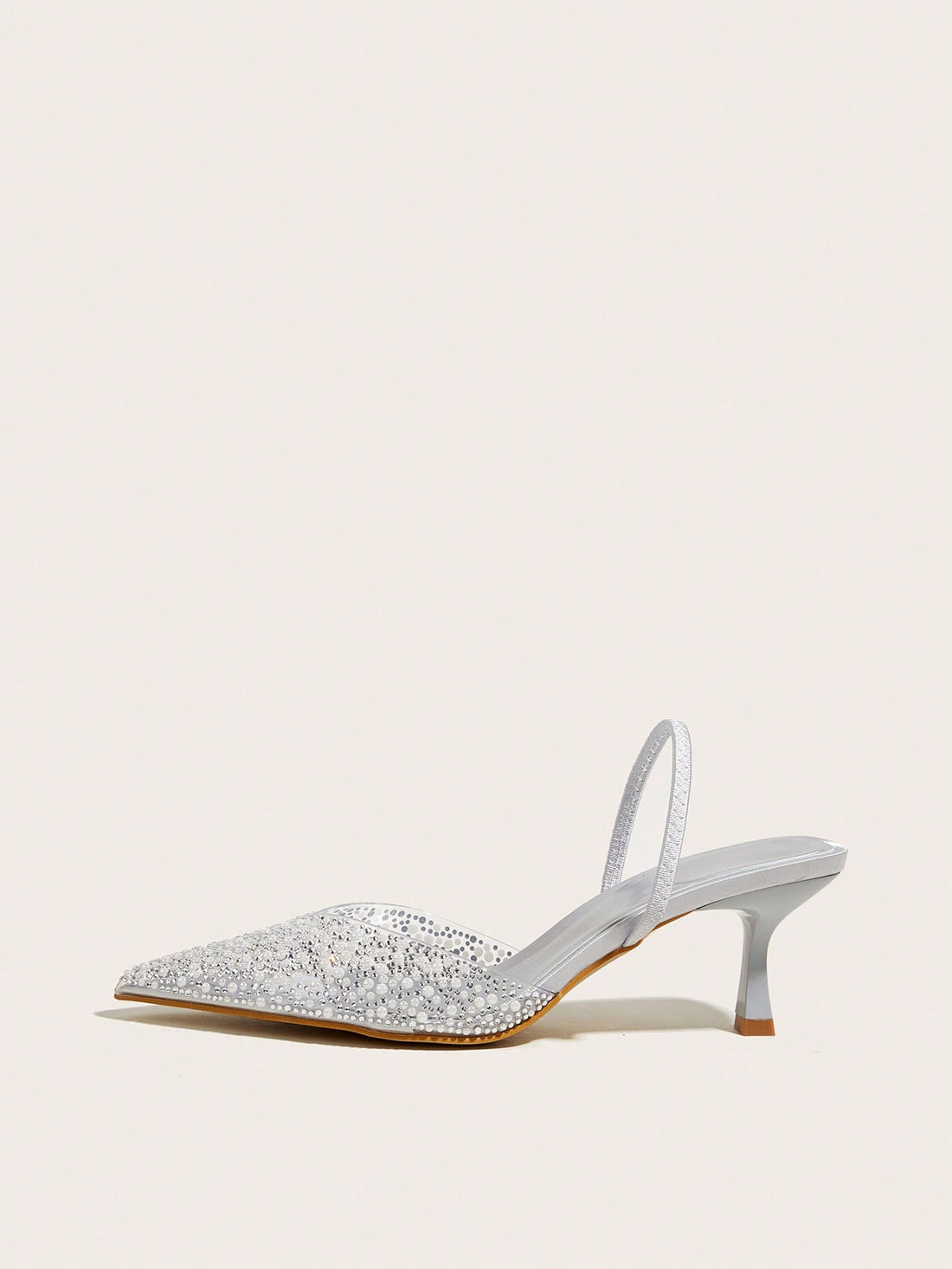 Introducing the ultimate fashion statement for spring and summer: the Dazzling Pearl and Rhinestone High Heel <a href="https://canaryhouze.com/collections/women-canvas-shoes" target="_blank" rel="noopener">Shoes</a>. Featuring stunning pearls and rhinestones, these shoes will add a touch of elegance and glamour to any outfit. Elevate your style with these must-have shoes.