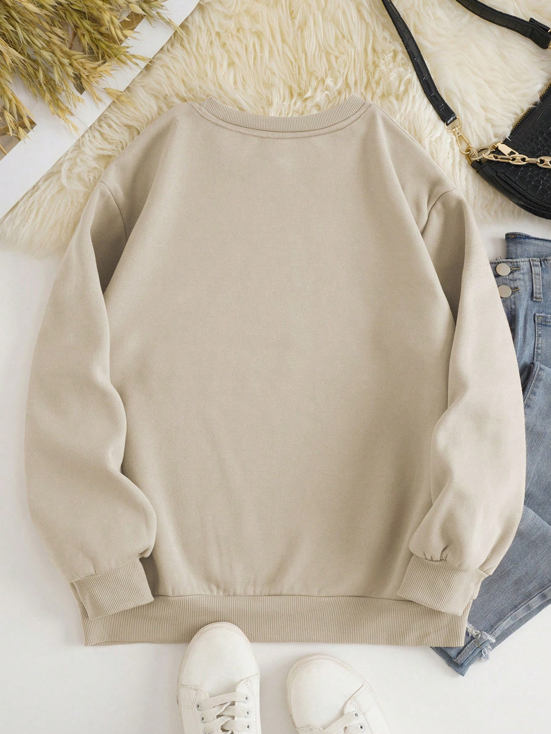 Stay warm and fashionable with our Cozy and Stylish: Slogan Graphic Thermal-Lined Sweatshirt. The thermal-lined design provides extra warmth, while the slogan graphic adds a touch of style. Perfect for staying comfortable and on trend this season.