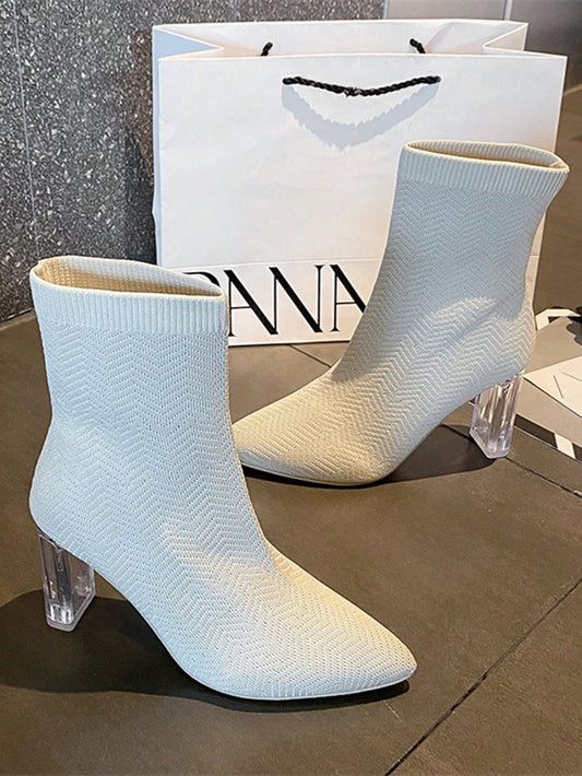 Elevate your style with Crystal Chic: Women's White Rhinestone Fashion <a href="https://canaryhouze.com/collections/women-boots" target="_blank" rel="noopener">Boots</a>. Designed for plus size women, these boots feature a stunning rhinestone design that adds a touch of glamour to any outfit. With expert craftsmanship and a comfortable fit, these boots are the perfect addition to your wardrobe.