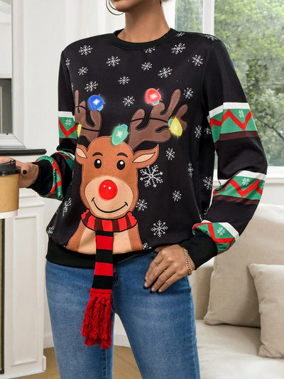 Cozy Christmas Vibes: Festive Print Tassel Sweatshirt