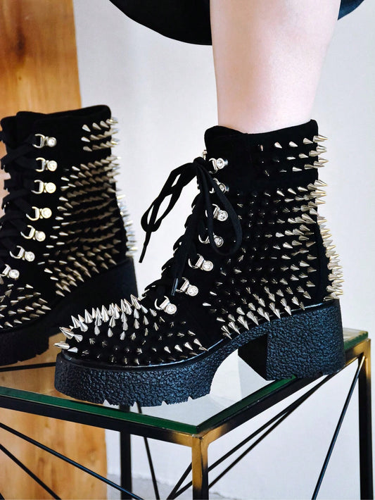 Elevate your fashion game with the Lucian Lace-Up Lug Platform Spike Ankle <a href="https://canaryhouze.com/collections/women-boots" target="_blank" rel="noopener">Boots</a>. These trendy boots feature a lace-up design, chunky platform sole, and edgy spike details. Perfect for adding height and attitude to any outfit. Step up your style game with these statement-making boots.