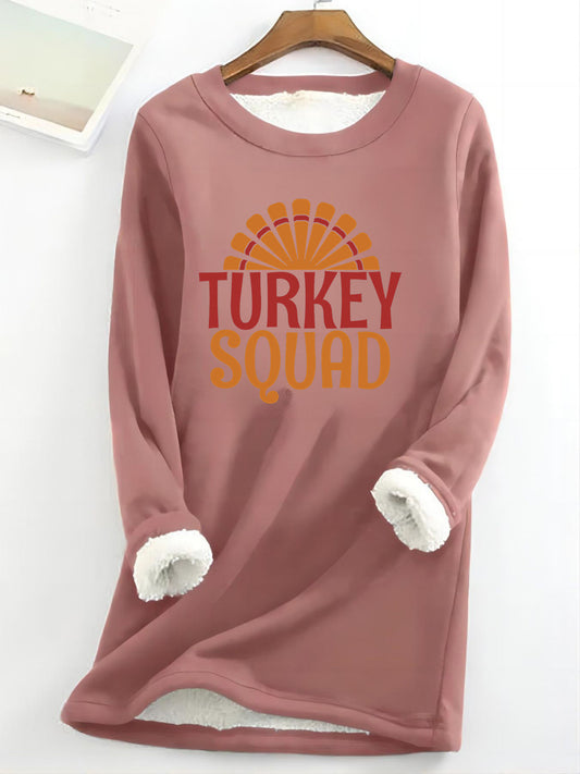 This soft and comfortable women’s sweatshirt is perfect for the fall and winter seasons. The long sleeve crew neck design with a Turkey Letter print adds a stylish touch, making it ideal for everyday wear. Crafted with a blend of cotton and polyester, it offers superior comfort and warmth.