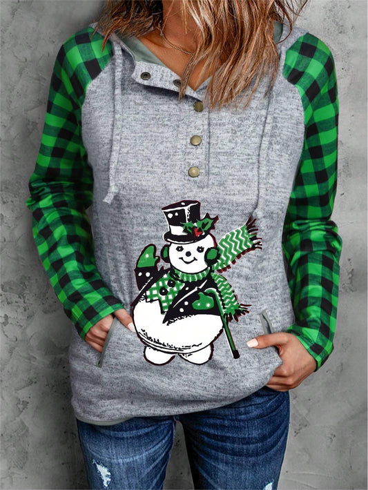 Add some cozy Christmas vibes to your wardrobe with our Snowman Plaid Print Raglan Sleeve Drawstring Hoodie. Featuring a festive snowman and plaid print, this hoodie is perfect for staying warm and stylish during the holiday season. The drawstring hood allows for a customized fit, making it your new go-to piece for chilly days.