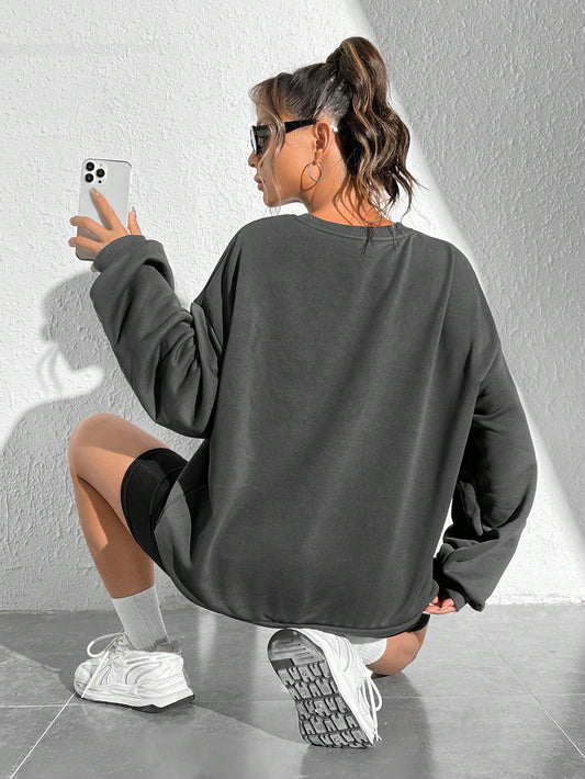 Cozy up in Style: Christmas Print Drop Shoulder Sweatshirt