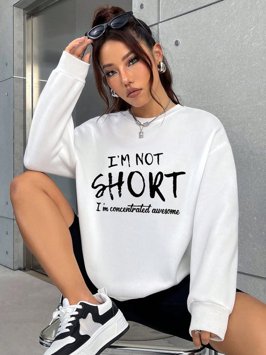 Stay cozy and trendy in our Slogan Graphic Drop Shoulder Sweatshirt. Made from high-quality materials, this sweatshirt features a unique slogan graphic design and comfortable drop shoulder fit. Perfect for a casual yet stylish look, stay warm and fashion-forward with this sweatshirt.