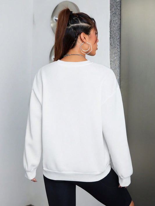Stay Cozy and Trendy with Our Slogan Graphic Drop Shoulder Sweatshirt