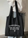 Stylish Black Canvas Tote Bag: Perfect for Shopping and Outings!