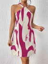 Sun-Kissed Style: Spring Break Graphic Print Halter Neck Dress