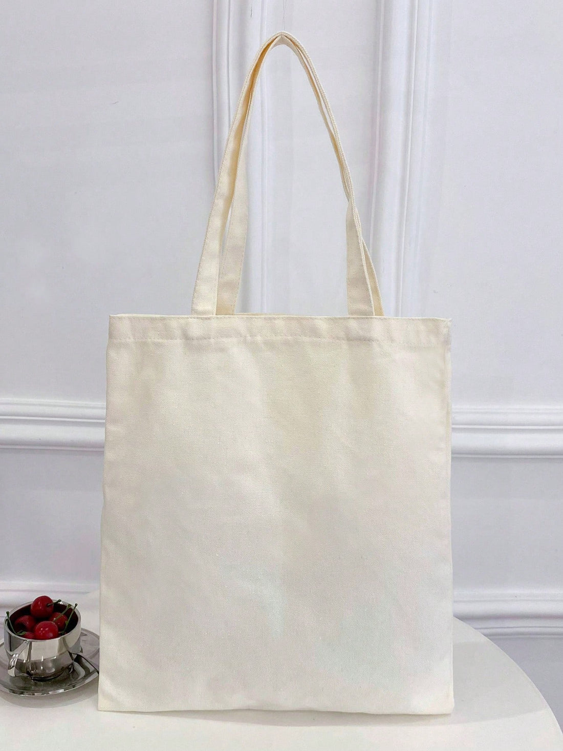 This stylish <a href="https://canaryhouze.com/collections/canvas-tote-bags" target="_blank" rel="noopener">canvas tote handbag</a> for women features a unique and trendy design of caffeine and cats. Made of durable canvas material, it is perfect for carrying everyday essentials with style. The perfect accessory for any cat lover who enjoys a good cup of caffeine.