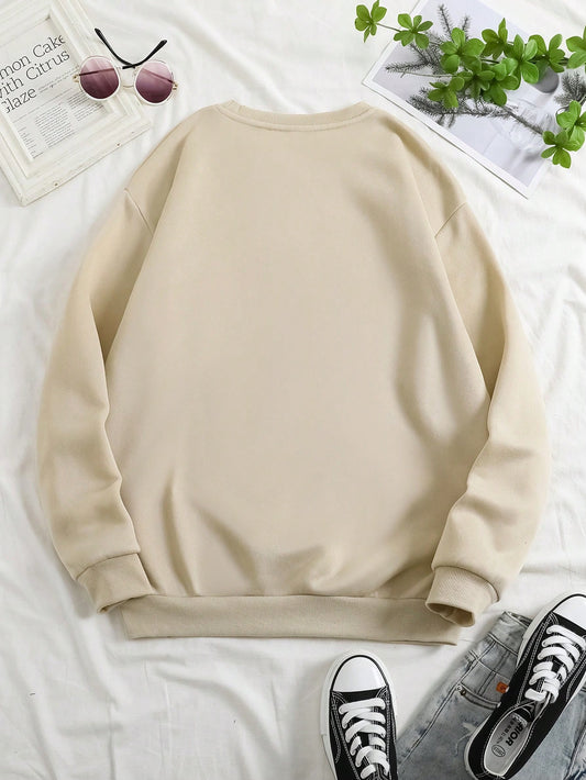 Get Cozy and Chic with our Plus Slogan Graphic Drop Shoulder Sweatshirt
