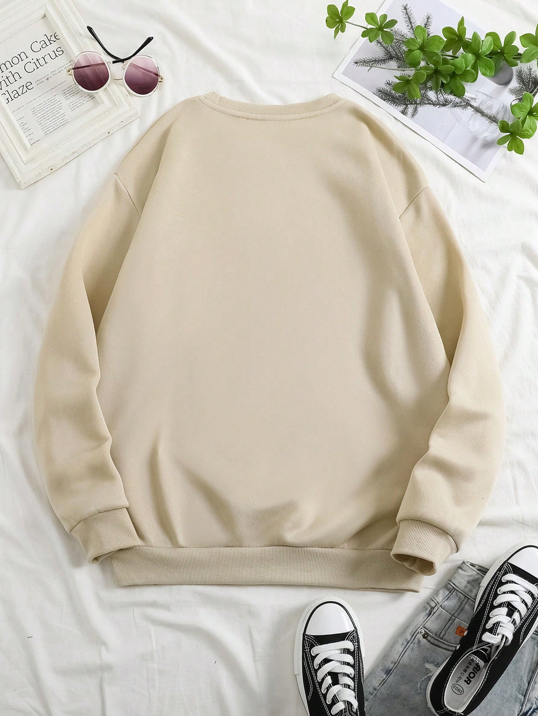Elevate your casual style with our Plus Slogan Graphic Drop Shoulder Sweatshirt. Featuring a cozy yet chic design, this sweatshirt is perfect for any occasion. The drop shoulder cut adds a trendy touch while the slogan graphic adds a playful element. Stay comfortable and stylish all day long.