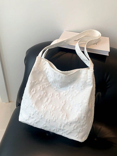 This foldable floral tote bag is the perfect street shopping companion for women. With its stylish design and spacious interior, it offers both fashion and function. Made to be easily folded and carried, it's the ideal accessory for any on-the-go fashionista, providing both style and convenience.