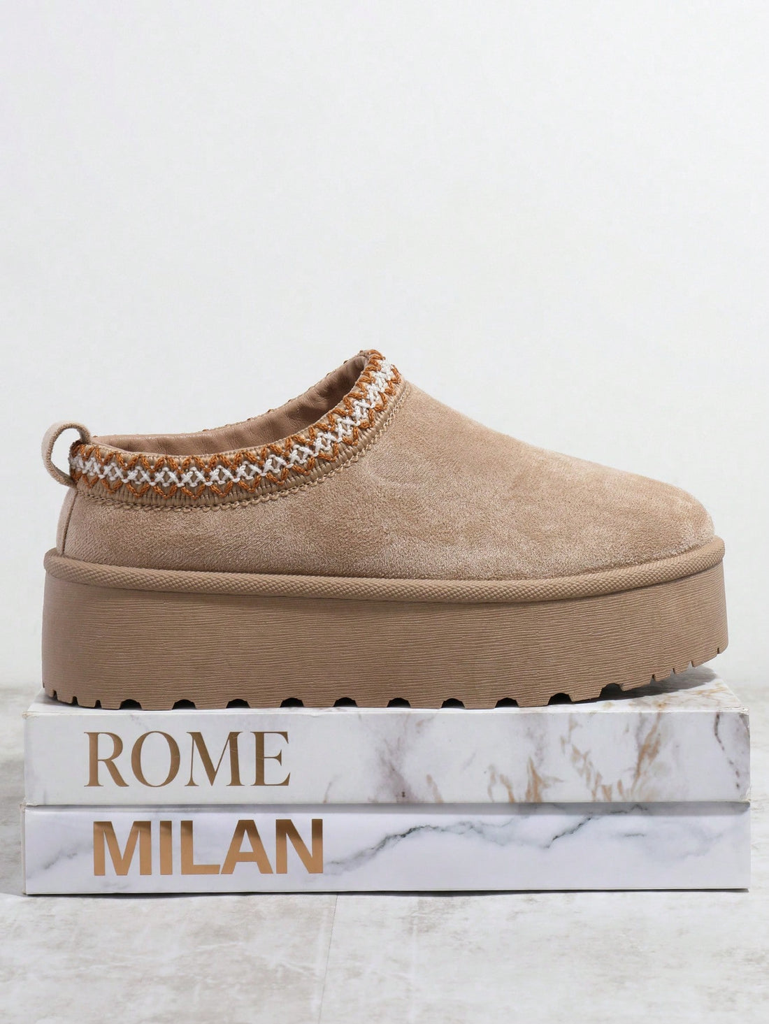 These Plain Flatform Warm Shoes from Stylish and Cozy are a perfect blend of fashion and comfort. With a stylish design, they are sure to elevate any outfit, while the flatform sole provides extra cushioning for all-day wear. Stay warm and on-trend with these must-have shoes.