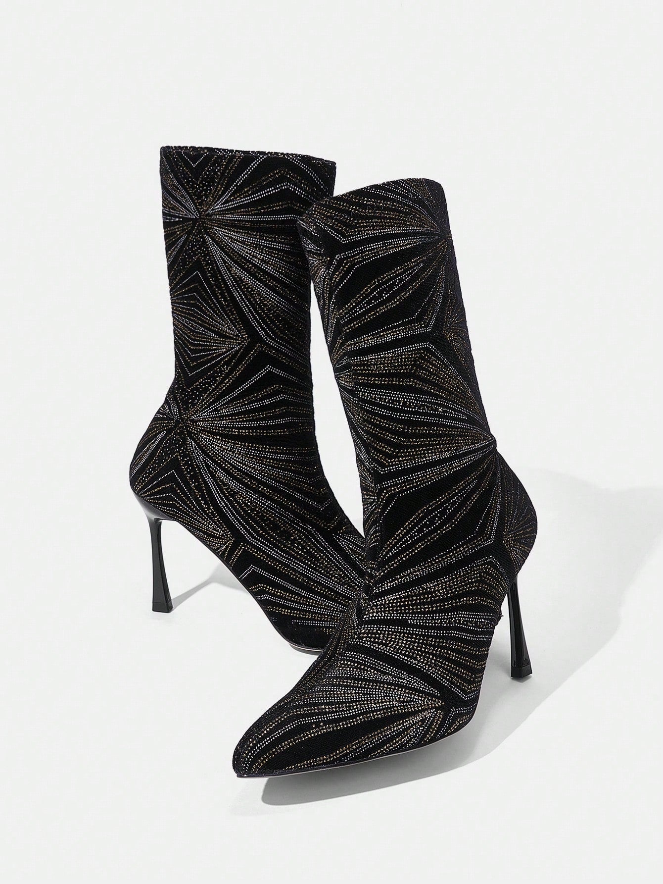 Elevate any outfit with Dazzling Diva: Rhinestone Decor Irregular Diamond Shape High Heel <a href="https://canaryhouze.com/collections/women-boots" target="_blank" rel="noopener">Boots</a>. Made with intricate diamond-shaped rhinestone decor and a stunning irregular heel, these boots are sure to make a statement. Experience luxury and glamour with every step.