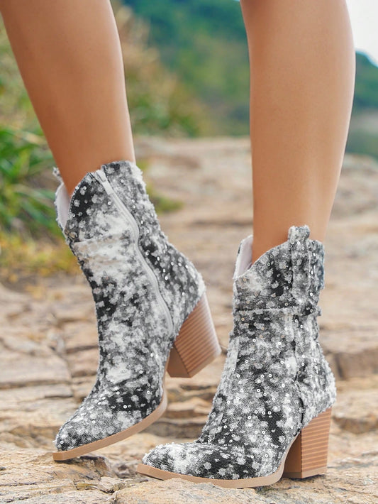 Introducing the Glitzy Cowgirl Styleloop Retro Western Sequined Cowboy Boots. Made with high quality materials and adorned with shimmering sequins, these boots are the perfect combination of style and durability. Embrace your inner cowgirl and make a statement with these retro-inspired boots.