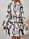 Effortlessly Chic: Graphic Print Mock Neck Lantern Sleeve Dress