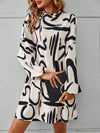 Effortlessly Chic: Graphic Print Mock Neck Lantern Sleeve Dress