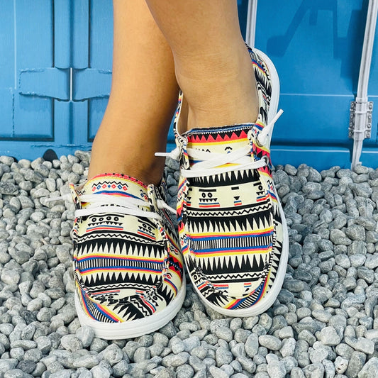 Upgrade your shoe collection with our Women's Colorful Geometric Print Canvas Loafers. These stylish and comfortable shoes are designed to make a statement with their vibrant print and provide lasting comfort for all-day wear. Step into style and comfort with these must-have loafers.