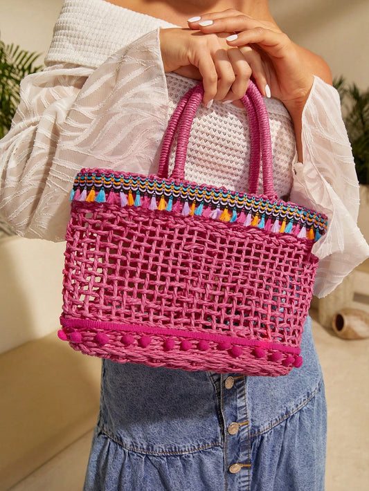 This handcrafted crochet bag boasts a touch of elegance with its tassel detail and double handle design. Each <a href="https://canaryhouze.com/collections/canvas-tote-bags" target="_blank" rel="noopener">bag</a> is individually made with meticulous care, ensuring high quality and unique craftsmanship. Experience style and functionality with this exquisite piece.