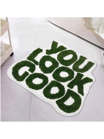 Enhance your bathroom decor with our Don't Slip and Slide bath mat. Made from microfiber, this non-slip rug is not only charming, but also absorbent and washable. Keep your bathroom safe and stylish with our vibrant green 'You Look Good' design.