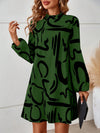 Chic Statement: Women's Lantern Sleeve Dress with All-Over Printed Pattern