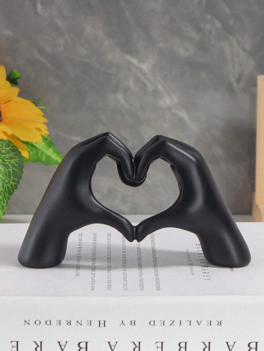 Add a touch of love to your home decor with our Resin Hand Gesture Heart Shape Ornament. Made of high-quality resin, this unique piece adds style and spreads love. The hand gesture symbolizes love and affection, making it a perfect gift for your loved ones.