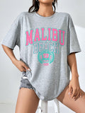 Stay comfortable and stylish with our Loose Fit Women's Letter Printed Drop Shoulder T-Shirt. Made with a loose fit and drop shoulder design, you'll have freedom of movement while staying on-trend. Plus, the letter print adds a cool touch to any outfit.