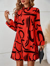 Effortlessly Chic: Graphic Print Mock Neck Lantern Sleeve Dress