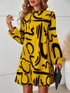 Chic Statement: Women's Lantern Sleeve Dress with All-Over Printed Pattern