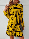 Chic Statement: Women's Lantern Sleeve Dress with All-Over Printed Pattern