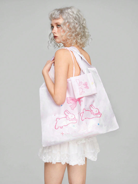 This Adorable Rabbit 2pc Set is the perfect shopping companion. The storage <a href="https://canaryhouze.com/collections/canvas-tote-bags" target="_blank" rel="noopener">bag</a> and coin purse feature an adorable rabbit design, adding a touch of cuteness to your errands. Keep your items organized and secure while adding a bit of fun to your day.