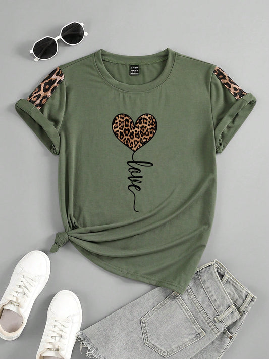 Introducing our Wild Heart Leopard Print T-Shirt for Women. Made with soft and comfortable fabric, this short sleeve t-shirt features a stylish leopard print, adding a touch of wildness to your wardrobe. Perfect for both casual and dressy occasions, this t-shirt is a must-have for any fashion-forward women.