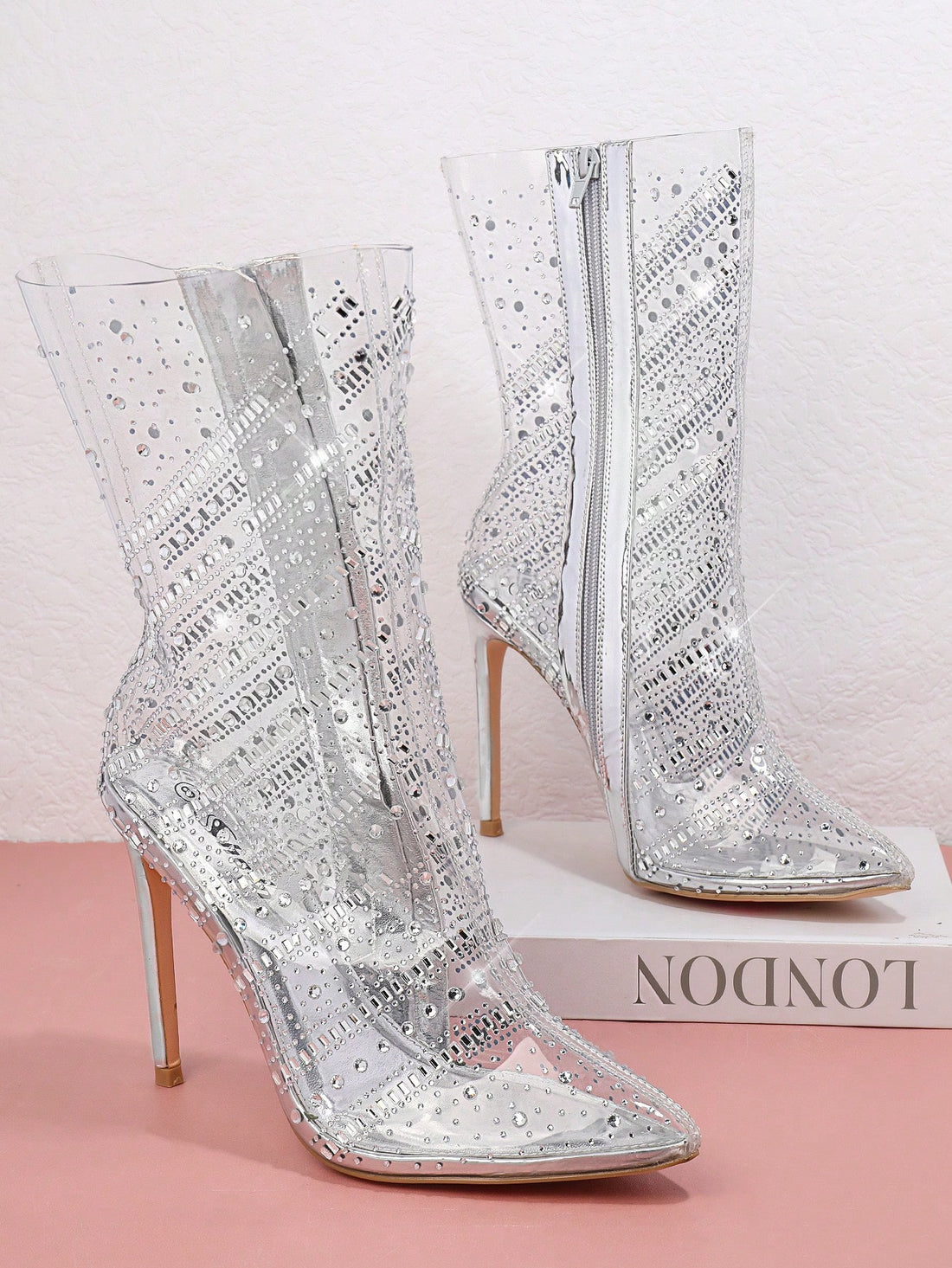 Illuminate your fashion with Sparkle &amp; Shine: Women's Fashion <a href="https://canaryhouze.com/collections/women-boots" target="_blank" rel="noopener">Boots</a>. These stunning boots feature rhinestone decoration, adding a touch of elegance to any outfit. Stay trendy and stylish while making a statement with these unique and glamorous boots. Upgrade your wardrobe today!