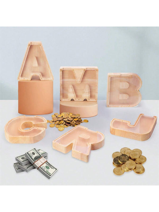 This Exquisite Wooden Transparent Alphabet Piggy Bank is the perfect gift for both babies and couples. Made from high-quality wood, it features a transparent design and alphabet decals, adding a touch of elegance to any room. Teach children the value of saving while also adding a stylish piece to your home decor.