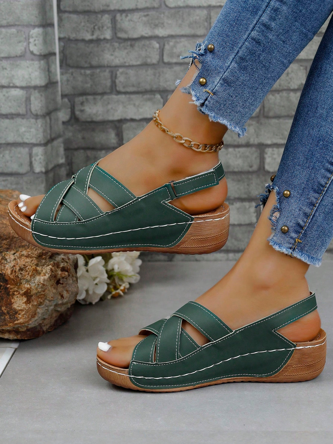 Elevate your summer style with these chic black and white wedges. Featuring a flattering ankle strap and unique crisscross strap detail, these <a href="https://canaryhouze.com/collections/women-canvas-shoes" target="_blank" rel="noopener">shoes</a> will add a touch of sophistication to any outfit. Stay on trend and comfortable with these versatile wedges.