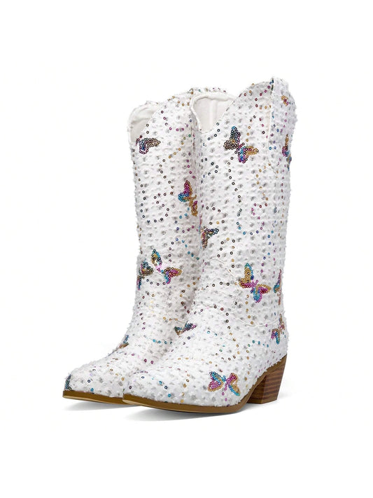 These Shimmering Sequin Denim Cowgirl <a href="https://canaryhouze.com/collections/women-boots" target="_blank" rel="noopener">Boots</a> are the perfect combination of style and function. With their mid-calf height and western design, they provide both comfort and a trendy look. The sequin detailing adds a touch of sparkle, while the durable denim material ensures long-lasting wear. Elevate your outfit with these stylish boots.