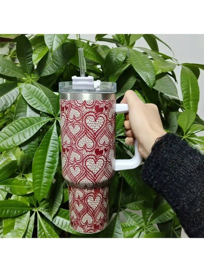 Stay hydrated while on the go with our Love on the Go <a href="https://canaryhouze.com/collections/tumblers" target="_blank" rel="noopener">car cup</a>! With a large 40oz capacity, heart-patterned stainless steel design, and Valentine's Day theme, this cup makes the perfect gift for your loved ones. Keep your drinks hot or cold for hours and spread the love wherever you go.