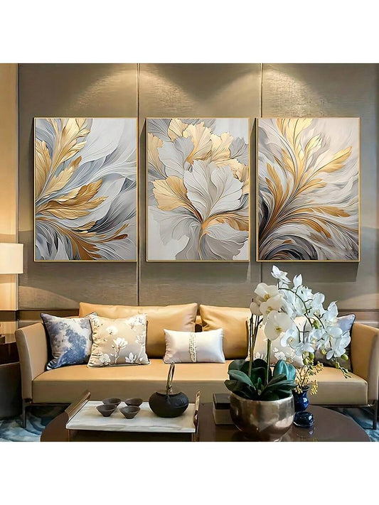 Enhance your home or office decor with our 3pc Luxury Golden and White Leaves Canvas Wall Art Set. Made with high-quality materials, these elegant art pieces feature a beautiful golden and white leaf design that adds a touch of luxury to any room. Perfect for adding a sophisticated touch to your space.