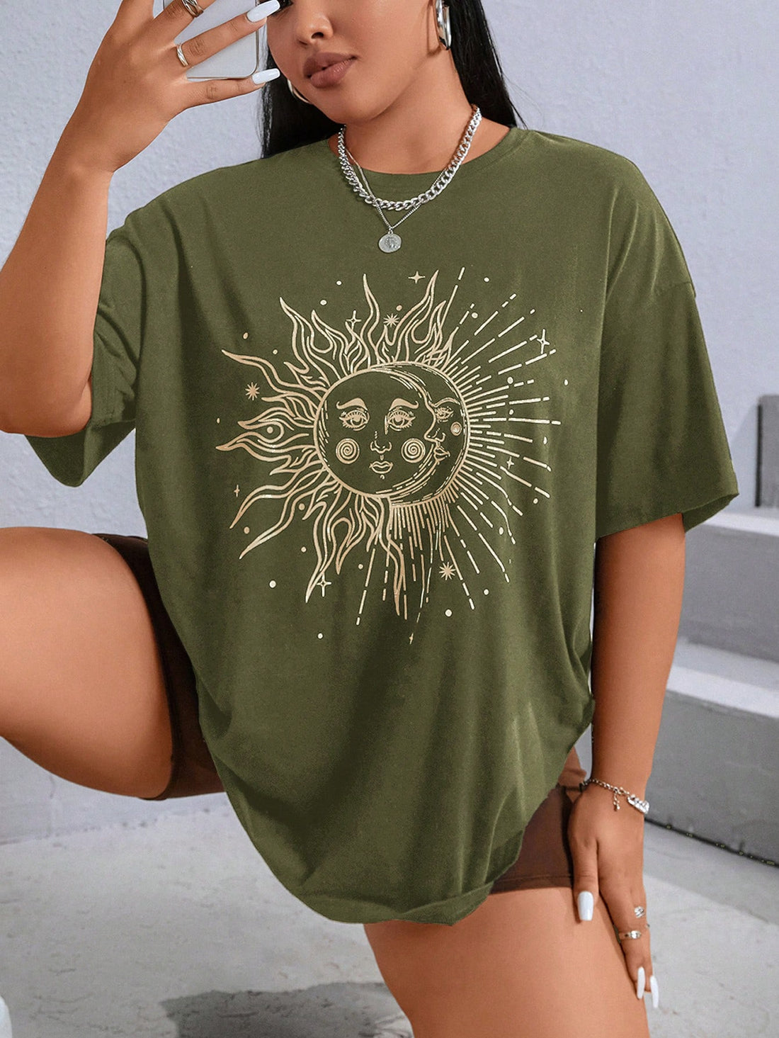 "Experience ultimate comfort and style with our Sun Moon Pattern Perfect: Plus Size Round Neck T-Shirt. Made for the plus size silhouette, this shirt features a unique sun and moon pattern that will elevate any outfit. Stay on trend and confident all day long."