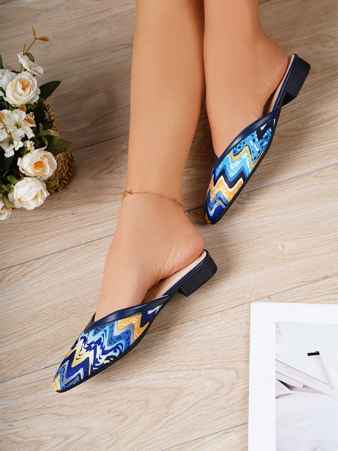 Upgrade your casual wardrobe with our Step into Style: New Spring and Summer Pointed Toe Mules. These stylish mules are designed to add a touch of sophistication to your everyday look. Featuring a pointed toe design, they are perfect for any casual occasion. Step into effortless style this season.