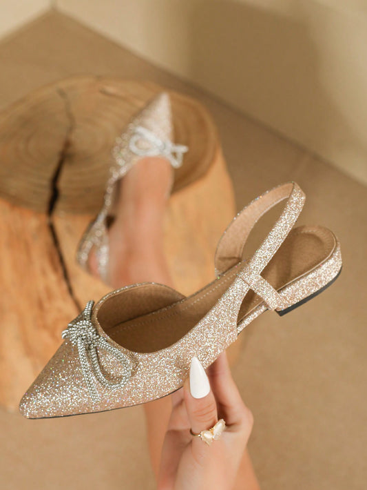 Upgrade your shoe collection with these Sparkling Rhinestone Butterfly Knot Low Heel Shoes. Designed for stylish women, these <a href="https://canaryhouze.com/collections/women-canvas-shoes" target="_blank" rel="noopener">shoes</a> feature a sparkling rhinestone butterfly knot that adds a touch of glamour to any outfit. With a low heel, these shoes provide both style and comfort. Elevate your fashion game with these must-have shoes.