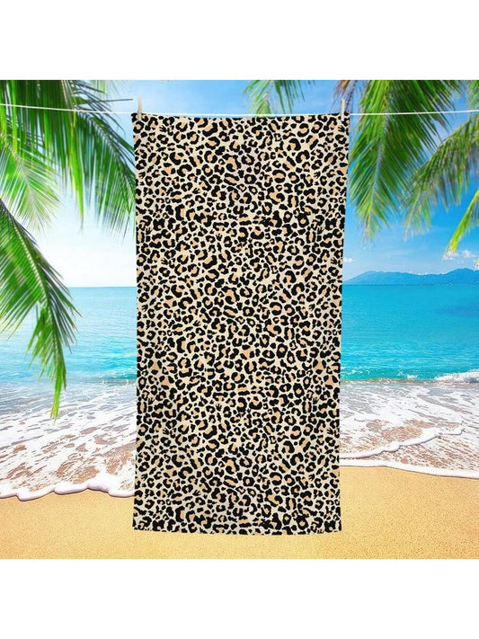 Indulge in luxury with our Ultra-Fine Fiber Leopard Print <a href="https://canaryhouze.com/collections/towels" target="_blank" rel="noopener">Beach Towel</a>. Made with the softest material, this towel offers ultimate absorbency and is the perfect travel companion. Its stylish leopard print adds a touch of elegance to your beach adventures. Say goodbye to bulky towels and hello to effortless style and comfort.