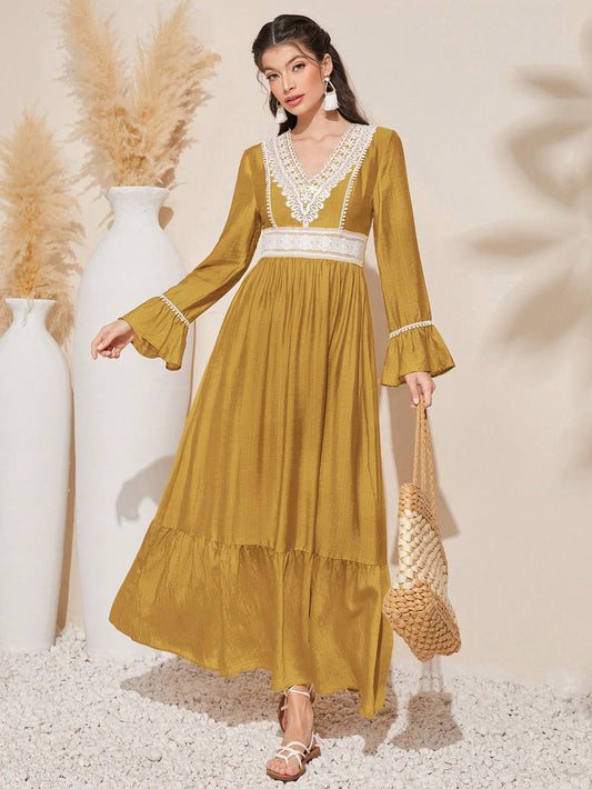 Chic Contrast: Women's Embroidered Bell Sleeve Dress