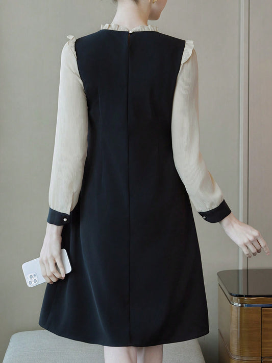 Chic and Elegant: Color Block Long Sleeve Dress with Button Decoration